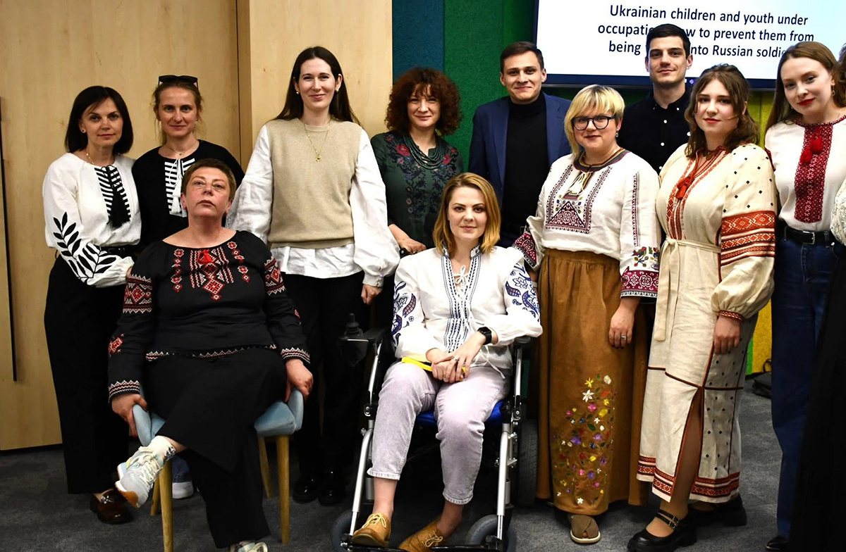Participants of a discussion on how to support Ukrainian children in the occupied territories. Dina is in the centre. Photo: ZMINA