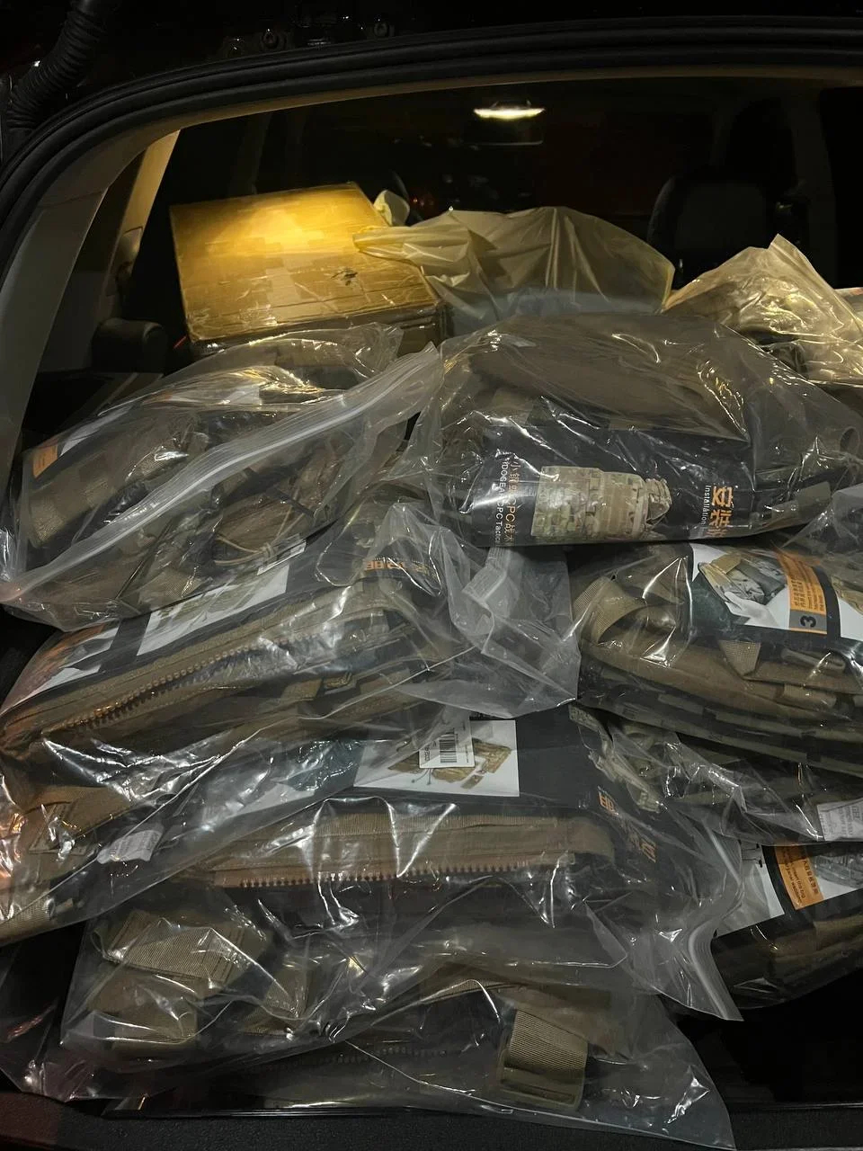 Packages with body armour. Photo: Telegram