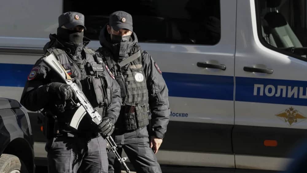 Armed police officers on duty outside a Moscow court during the trial of Oleg Orlov, the chairman of human rights group Memorial, in October. Photo: EPA-EFE/YURI KOCHETKOV