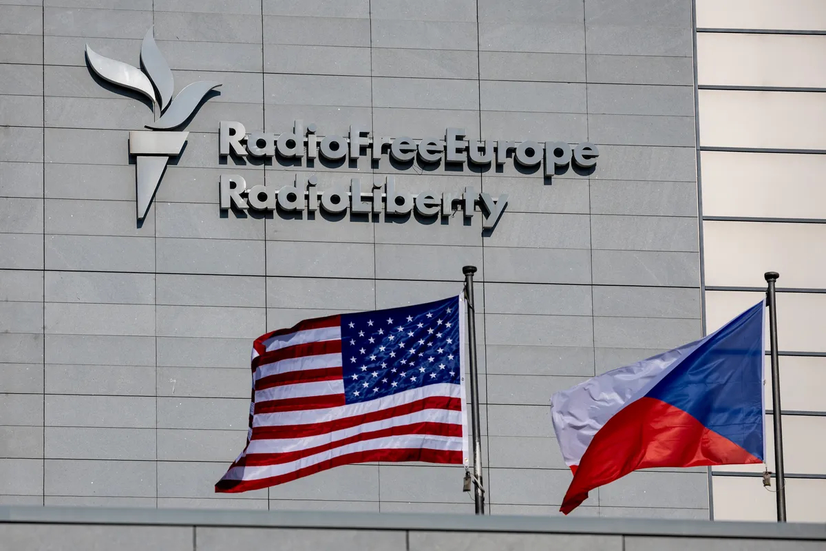 The US and Czech flags fly in front of RFE/RL headquarters in Prague, Czechia, 10 February 2025. Photo: EPA-EFE/MARTIN DIVISEK