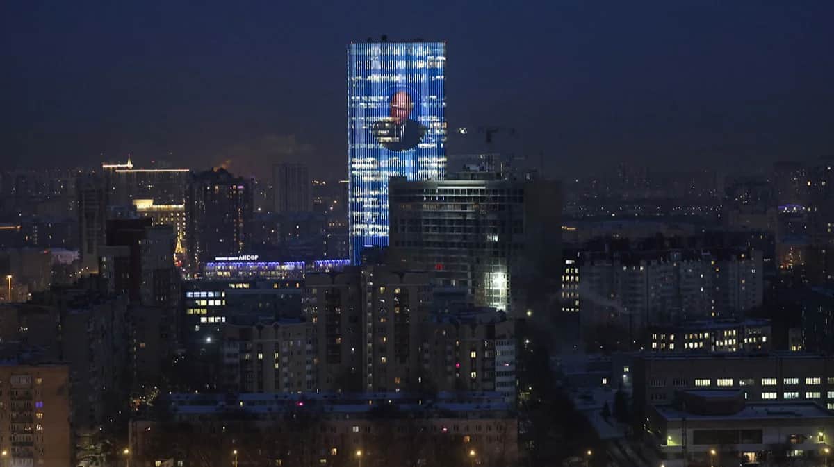 A digital image of Vladimir Putin seen on a business centre building in St. Petersburg, 18 December 2024. Photo: EPA-EFE/ANATOLY MALTSEV