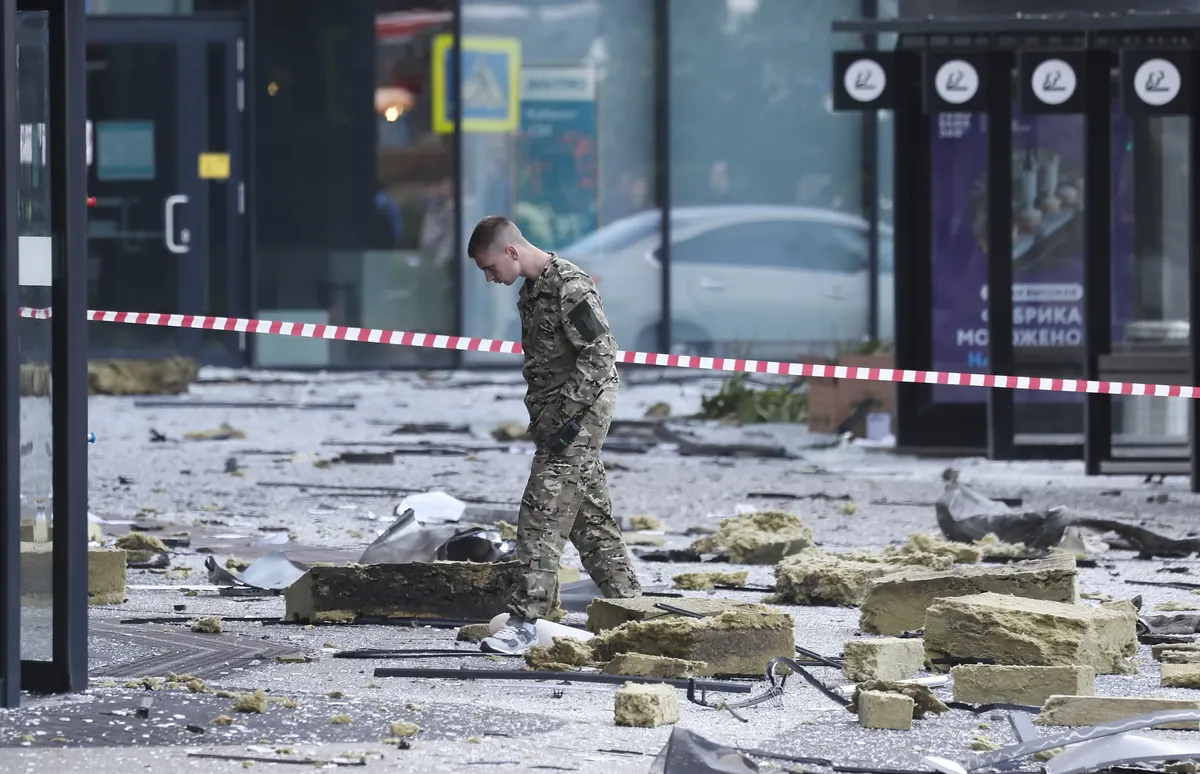 Inspecting the site of a damaged building in the Moscow-City business centre following a Ukrainian drone attack in Moscow on 30 July 2023. Photo: EPA-EFE/YURI KOCHETKOV