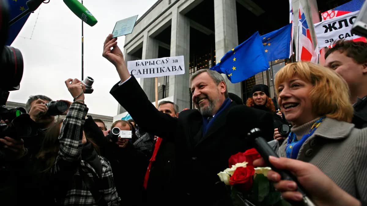 Andrey Sannikov shows his certificate of candidacy in the 2010 Belarusian presidential election. Minsk, November 2010. Photo: EPA/TATYANA ZENKOVICH