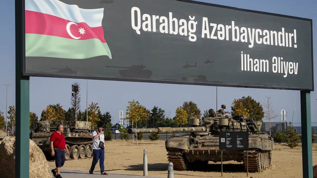 A sign reads ”Karabakh is Azerbaijan!” at a park displaying military trophies from the second Karabakh war, in Baku, Azerbaijan, 5 September 2023. Photo: EPA / MAXIM SHIPENKOV