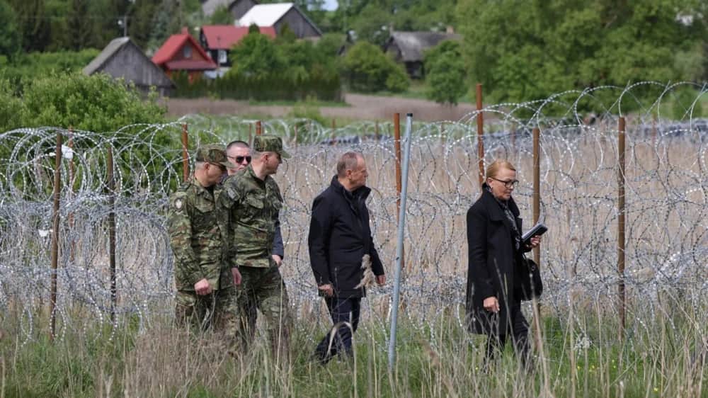 Polish Prime Minister Donald Tusk during a visit to the border with Belarus in Ozierany Wielkie, 11 May 2024. Photo: EPA-EFE/PAWEL SUPERNAK