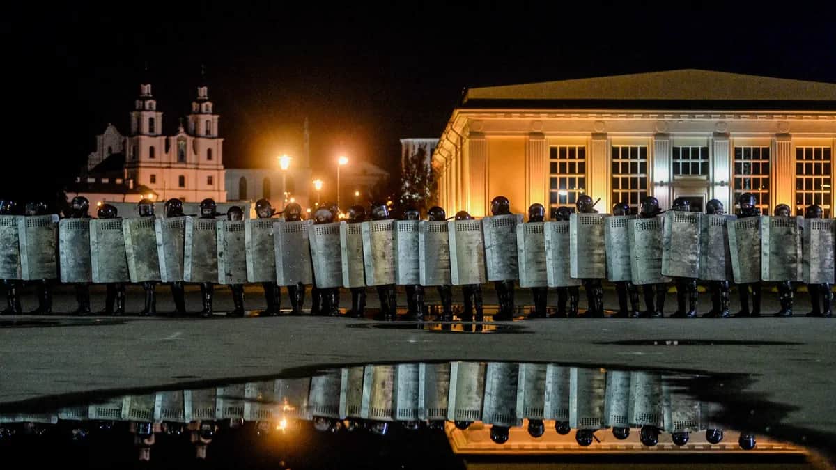 Police stand guard during a protest after polling stations closed at the presidential elections in Minsk, Belarus, 9 August 2020. EPA-EFE/YAUHEN YERCHAK