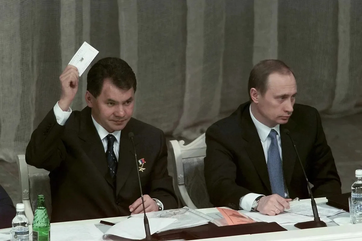 Acting Russian President Vladimir Putin and Emergencies Minister Sergey Shoigu vote during the Unity party congress, at the Moscow Kremlin, 27 February 2000. Photo: EPA PHOTO EPA/SERGEY CHIRIKOV