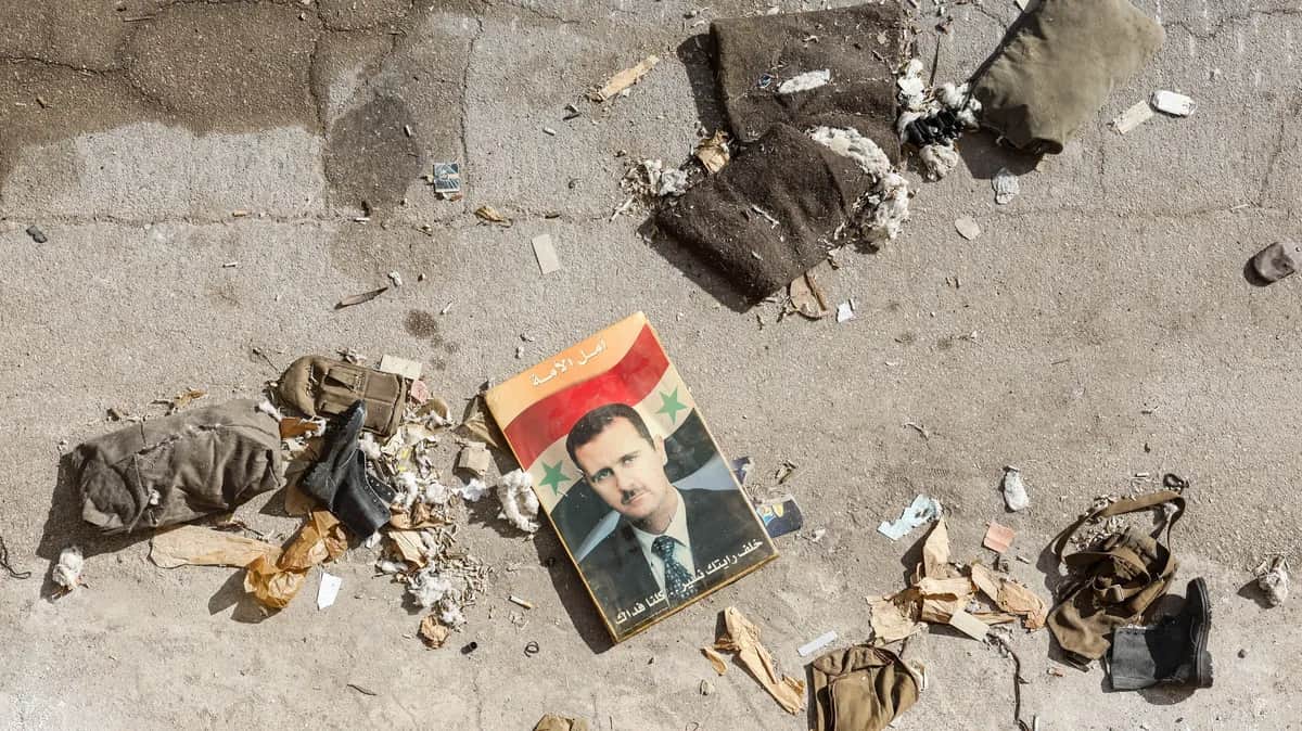 A portrait of former Syrian dictator Bashar al-Assad on the ground at the Mezzeh Air Base on the outskirts of Damascus, Syria, 16 December 2024. Photo: EPA-EFE/ANTONIO PEDRO SANTOS