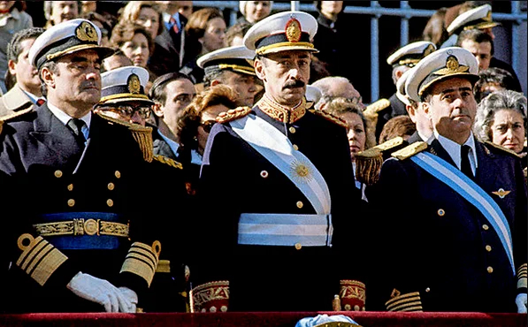 The “first military junta” — Admiral Emilio Massera, Lieutenant General Jorge Videla and Brigadier General Orlando Agosti (from left to right) — observing the Independence Day military parade on Avenida del Libertador, Argentina, 9 July 1978. Photo by Argentine government
