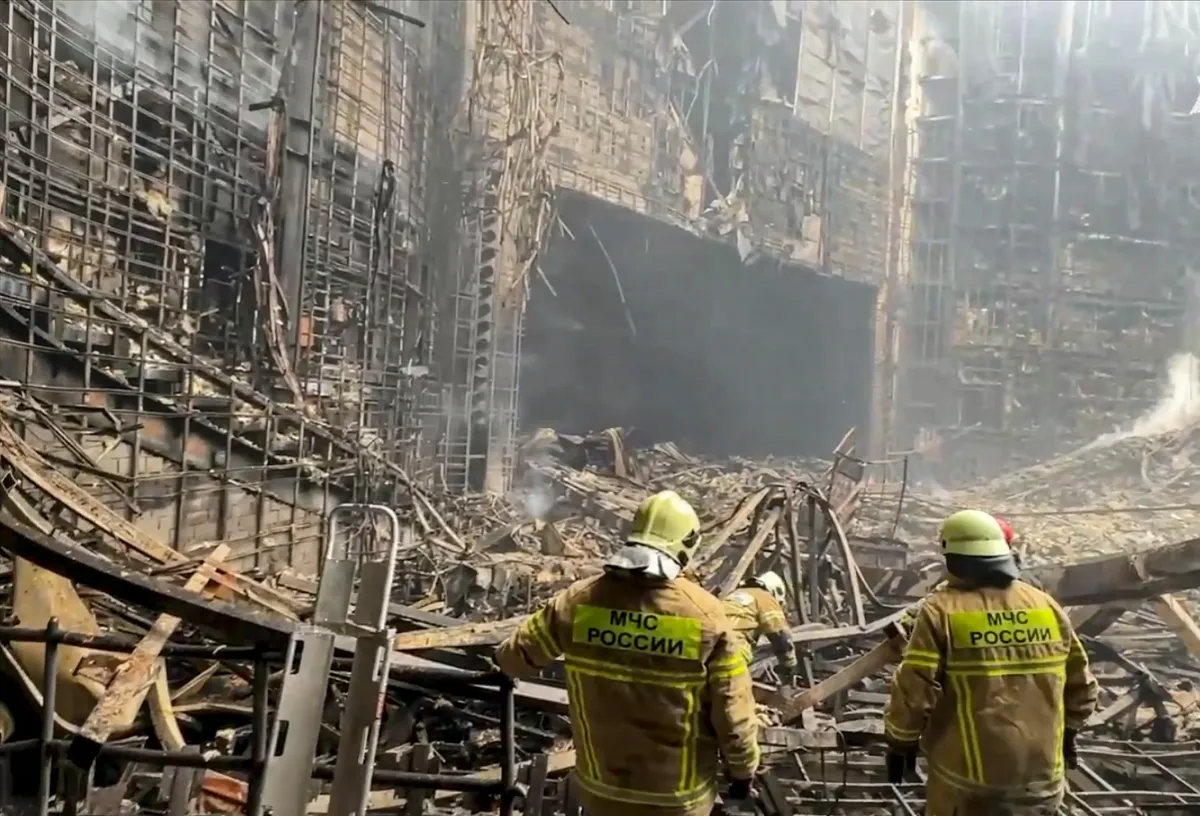 Rescue workers in the ruins of the Crocus City Hall concert venue, 23 March 2024. Photo: EPA-EFE / RUSSIAN INVESTIGATIVE COMMITTEE