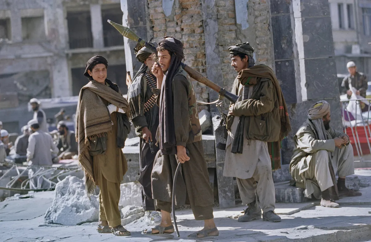 Young Afghan men in Kabul, Afghanistan, 1996. Photo by David Turnley/Corbis/VCG via Getty Images