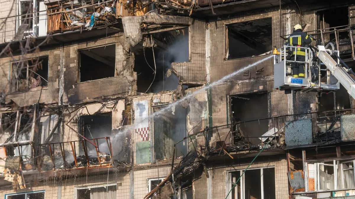 <span>Emergency services work the site of a Russian strike on a nine-storey residential building in Kyiv, Ukraine, 14 November 2025, amid the Russian invasion. At least four people were killed and dozens others injured, including two children, as a result of the overnight combined Russian attacks on Kyiv using more than 400 shock drones and about 20 missiles of different types, according to the Kyiv City Military Administration. EPA/MAXYM MARUSENKO</span>