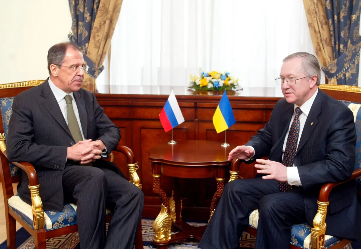 Sergey Lavrov speaks with Ukrainian Foreign Minister Boris Tarasyuk in Kyiv, Ukraine, 21 February 2005. EPA/SERGEY DOLZHENKO