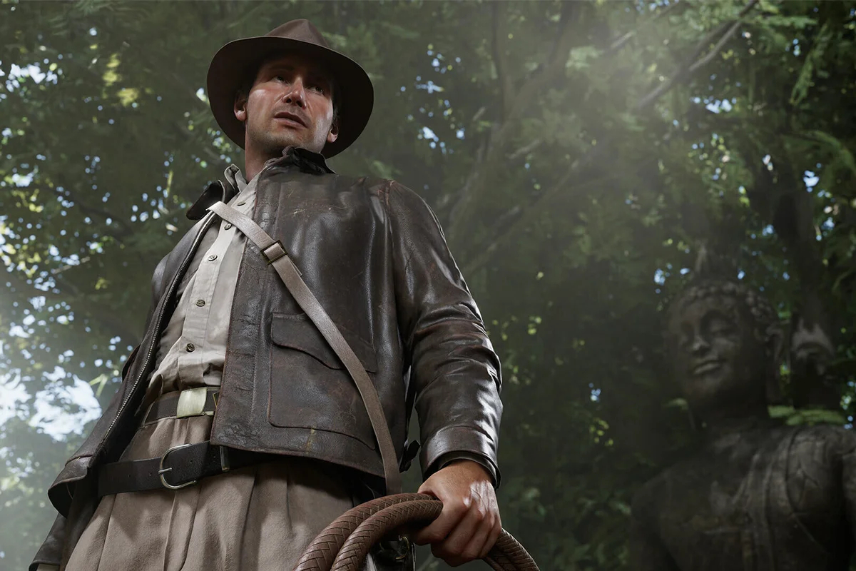 Индиану Джонса <a href="https://www.pcgamer.com/games/action/troy-baker-isnt-trying-to-do-a-bang-on-impression-of-harrison-ford-for-indiana-jones-and-the-great-circle/" rel="noopener noreferrer" title="https://www.pcgamer.com/games/action/troy-baker-isnt-trying-to-do-a-bang-on-impression-of-harrison-ford-for-indiana-jones-and-the-great-circle/">озвучил</a> актер Трой Бейкер, известный по роли Джоэла в The Last of Us. Кадр: <a href="https://www.xbox.com/ru-RU/games/store/indiana-jones-and-the-great-circle/9N8FQ28Z6QX3" rel="noopener noreferrer" title="https://www.xbox.com/ru-RU/games/store/indiana-jones-and-the-great-circle/9N8FQ28Z6QX3">Bethesda Softworks</a>