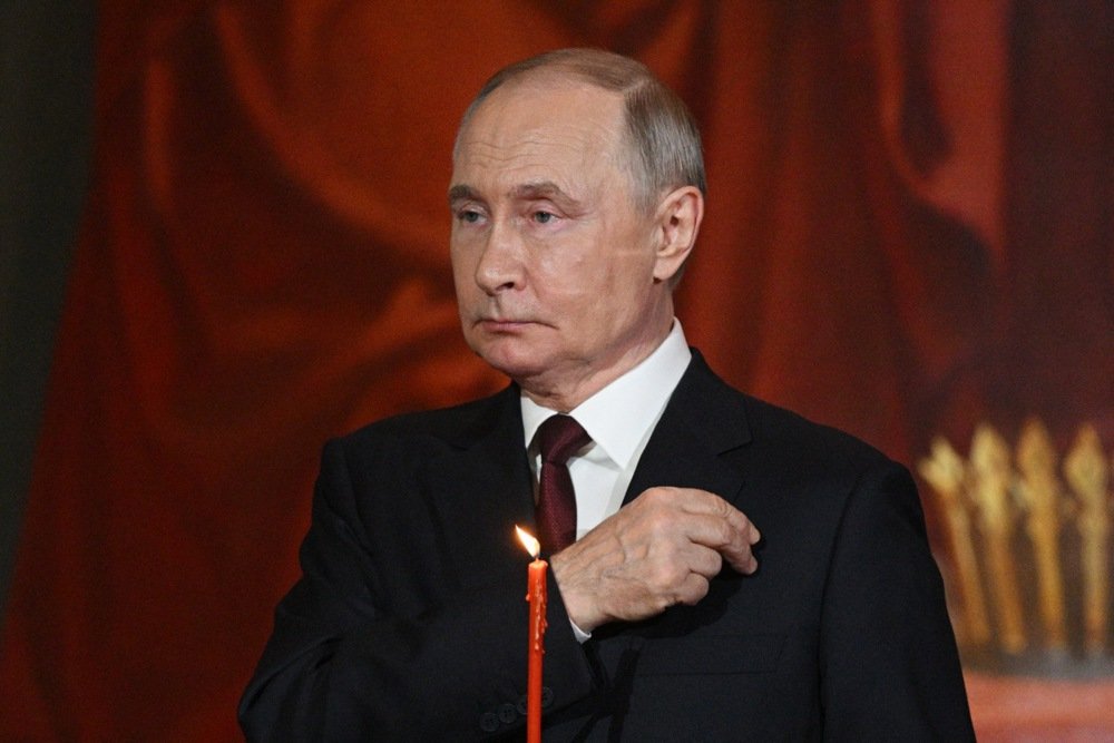Vladimir Putin attends the Orthodox Easter service at the Cathedral of Christ the Saviour in Moscow, Russia, 20 April 2025. Photo: EPA/RAMIL SITDIKOV / SPUTNIK / KREMLIN